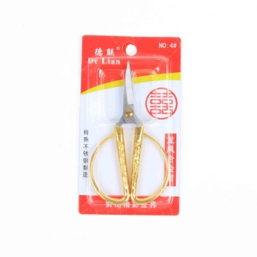 صورة  مقص دي لينا الذهبي الحاد 